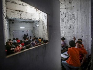 Škola u predgrađu Damaska, Sirija, bombardirana je tijekom listopada, najmanje 13 studenata je ubijeno, Foto: EPA/MOHAMMED BADRA.